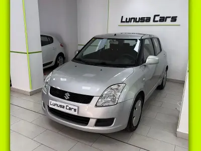 Usado Suzuki Swift GLX 92 CV (67 kW) 2010 Gris / plata Utilitario