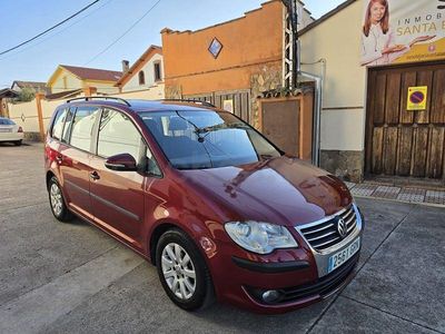 Usado VW Touran Advance 105 CV (77 kW) 2010 Granate Monovolumen