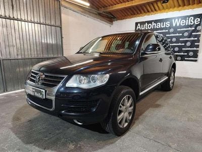 Second-hand VW Touareg R 174 CP (127 kW) 2007 Negru SUV