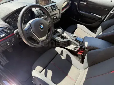 Usado BMW 118 Comfort Edition 170 CV (125 kW) 2013 Negro Utilitario