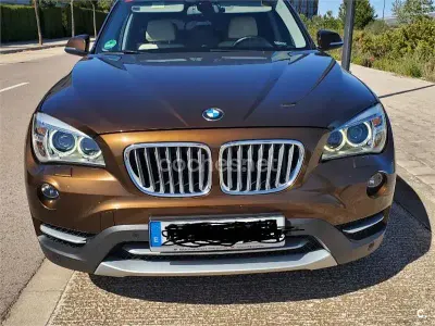 Käytetty BMW X1 177 HP (130 kW) 2013 Ruskea Katumaasturi