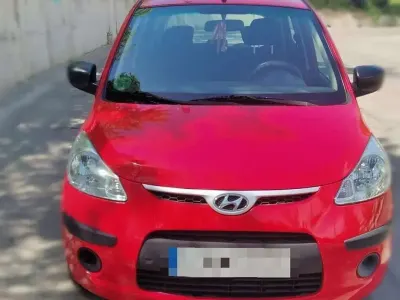 Usado Hyundai i10 Style 77 CV (56 kW) 2010 Rojo Utilitario