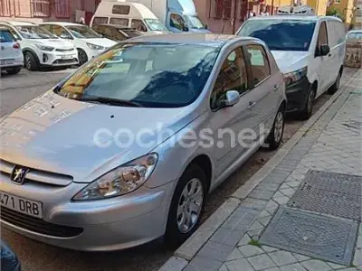 Usado Peugeot 307 110 HP (80 kW) 2005 Cinzento Sedan