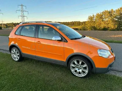 Usado VW Polo Cross 105 CV (77 kW) 2006 Naranja Utilitario