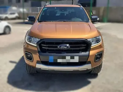 Usado Ford Ranger Wildtrack 213 CV (156 kW) 2022 Naranja Pickup/Camioneta