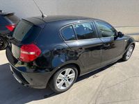 Usado BMW 118 Advantage 143 CV (105 kW) 2010 Negro Utilitario
