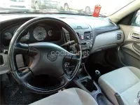 Usado Nissan Almera 114 CV (83 kW) 2001 Negro Berlina