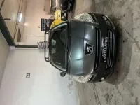 Usado Peugeot 5008 Active 111 CV (81 kW) 2012 Verde Monovolumen