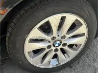 Usado BMW 116 115 CV (84 kW) 2009 Negro Utilitario