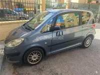 Usado Peugeot 1007 75 CV (55 kW) 2005 Gris / plata Monovolumen