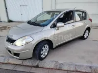 Occasion Nissan Tiida Tekna 105 ch (77 kW) 2010 Beige Berline