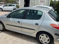 Usado Peugeot 206 109 CV (80 kW) 2003 Gris Utilitario