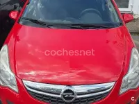 Usado Opel Corsa Selective 75 HP (55 kW) 2011 Vermelho Citadino