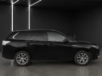 Usado Mitsubishi Outlander P-HEV 203 CV (149 kW) 2014 Negro Pickup/Camioneta