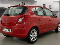 Usado Opel Corsa Cosmo 90 CV (66 kW) 2010 Rojo Utilitario
