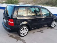 Usado VW Touran Highline 140 CV (102 kW) 2006 Negro Monovolumen