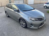 Usado Toyota Auris Hybrid Advance 136 CV (100 kW) 2015 Gris / plata Familiar