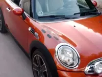 Usado Mini Cooper D 111 CV (81 kW) 2011 Naranja Utilitario