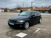 Usado BMW 118 136 CV (100 kW) 2008 Negro Utilitario