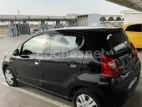 Usado Nissan Pixo Acenta 68 CV (50 kW) 2010 Negro Utilitario