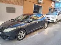 Usado Renault Mégane Dynamique 106 CV (77 kW) 2010 Gris Utilitario
