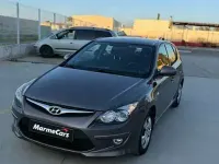 Usado Hyundai i30 Comfort 90 CV (66 kW) 2011 Gris Utilitario