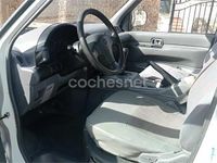 Usado Nissan Cargo 75 CV (55 kW) 2000 Blanco Familiar