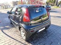Usado Peugeot 107 68 CV (50 kW) 2011 Negro Utilitario