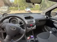 Usado Toyota Aygo 54 CV (39 kW) 2009 Negro Utilitario