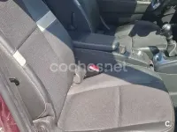 Usado Renault Scénic III Dynamique 130 CV (95 kW) 2013 Granate Monovolumen