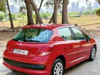 Usado Peugeot 207 70 CV (51 kW) 2012 Rojo Berlina