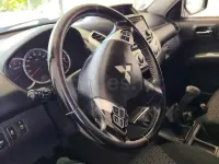 Usado Mitsubishi L200 136 CV (100 kW) 2015 Gris / plata Pickup/Camioneta
