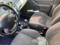 Usado Ford Focus Trend 115 CV (84 kW) 2004 Gris / plata Berlina