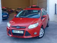 Usado Ford Focus Trend 125 CV (91 kW) 2011 Naranja Utilitario