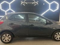 Usado Mazda 2 Active 68 CV (50 kW) 2009 Gris / plata Utilitario