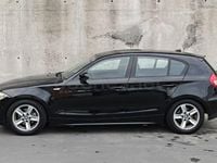 Usado BMW 118 122 CV (89 kW) 2006 Negro Utilitario