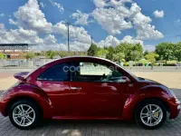 Usado VW New Beetle 102 CV (75 kW) 2003 Rojo Utilitario