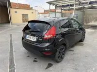 Usado Ford Fiesta Titanium 95 CV (69 kW) 2011 Negro Berlina