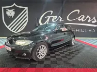 Usado BMW 118 122 CV (89 kW) 2006 Negro Utilitario
