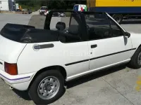 Usado Peugeot 205 75 CV (55 kW) 1989 Blanco Descapotable