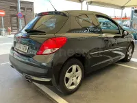 Usado Peugeot 207 Active 95 CV (69 kW) 2011 Negro Berlina