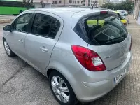 Usado Opel Corsa 95 CV (69 kW) 2010 Gris / plata Utilitario