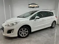 Usado Peugeot 308 SW Access 92 CV (67 kW) 2014 Blanco Familiar