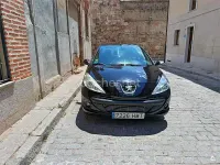 Usado Peugeot 206+ 60 CV (44 kW) 2012 Negro Utilitario