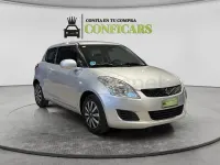 Usado Suzuki Swift 95 CV (69 kW) 2013 Gris / plata Utilitario