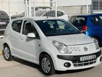 Usado Nissan Pixo Acenta 68 CV (50 kW) 2010 Blanco Utilitario