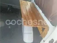 Usado Nissan Cargo 75 CV (55 kW) 1999 Blanco Familiar