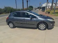 Usado Peugeot 308 110 CV (80 kW) 2010 Gris / plata Berlina