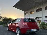Usado BMW 116 122 CV (89 kW) 2008 Rojo Utilitario