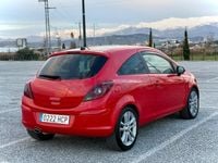 Usado Opel Corsa Selective 100 CV (73 kW) 2011 Rojo Utilitario